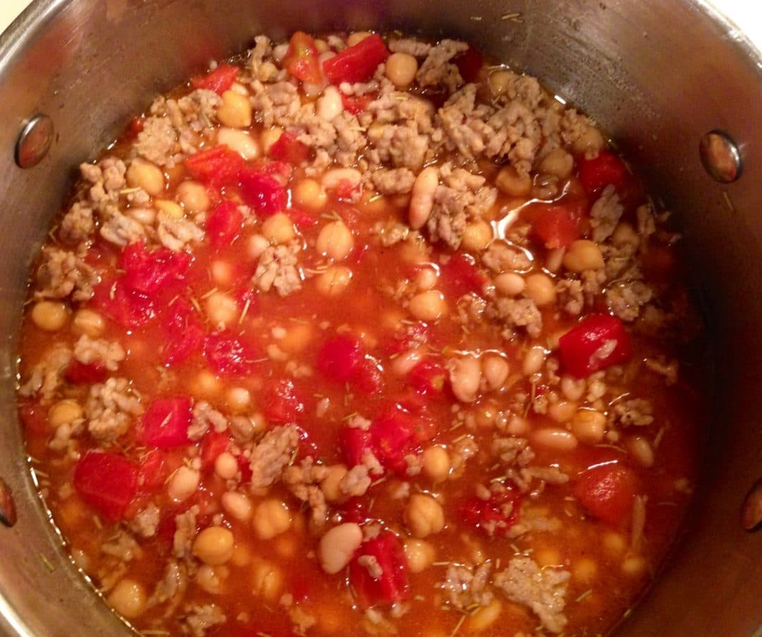 Overhead view finished soup in pot