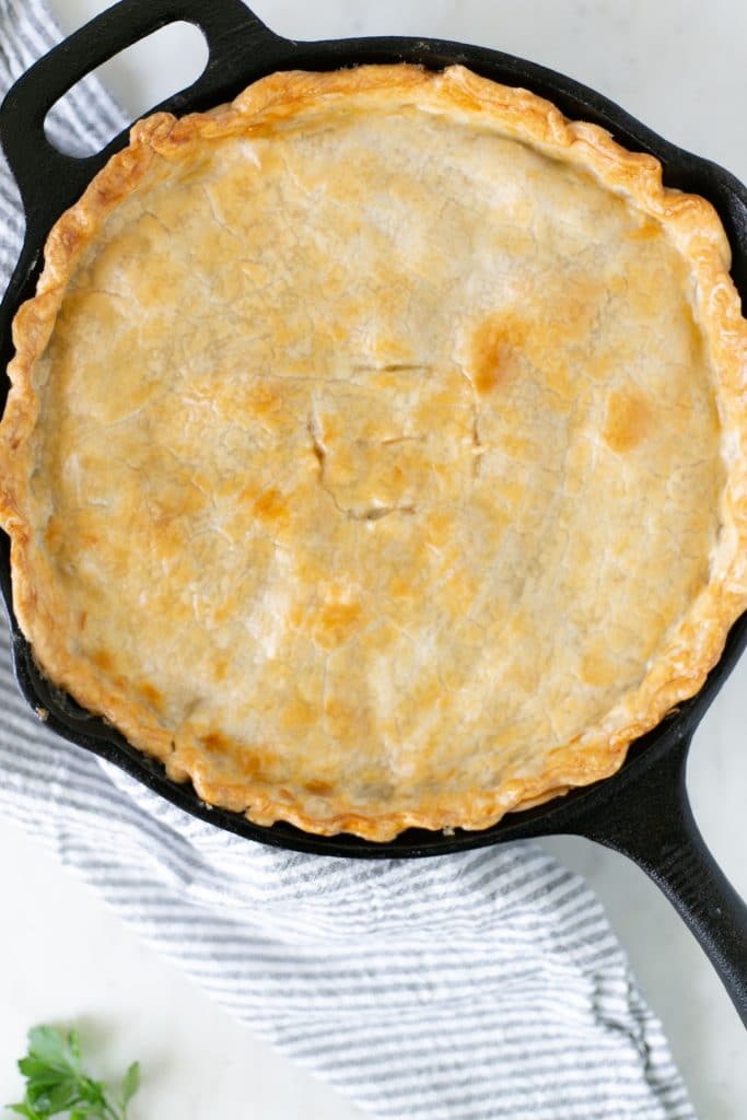 Overhead view Easy Chicken Pot Pie in cast iron skillet