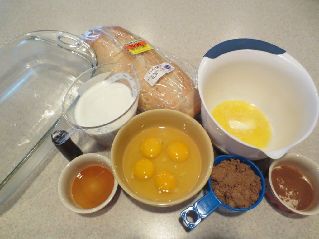 ingredients needed to make french toast in separate bowls and containers on kitchen counter 