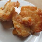 Close up view of two cobblers on white plate.