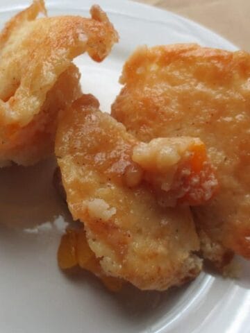 Close up view of two cobblers on white plate.