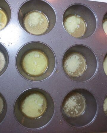 Melted butter in muffin pan.
