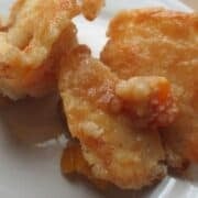Close up view of cobbler on white plate.