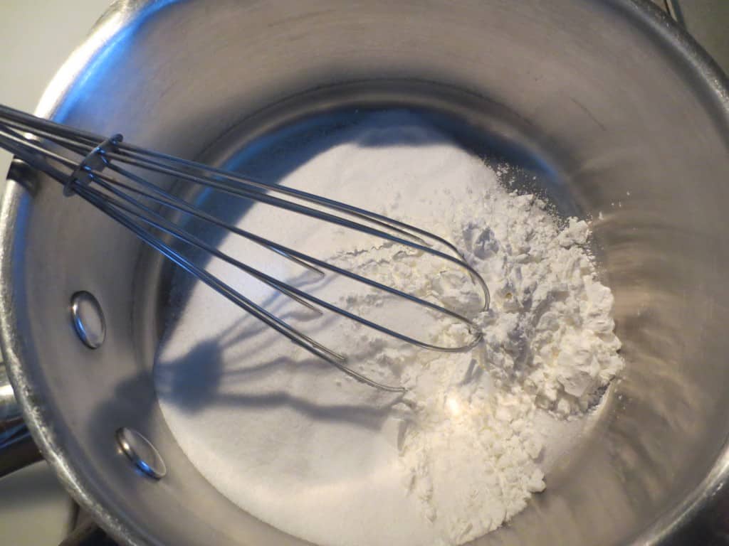 dry ingredients added to saucepan 
