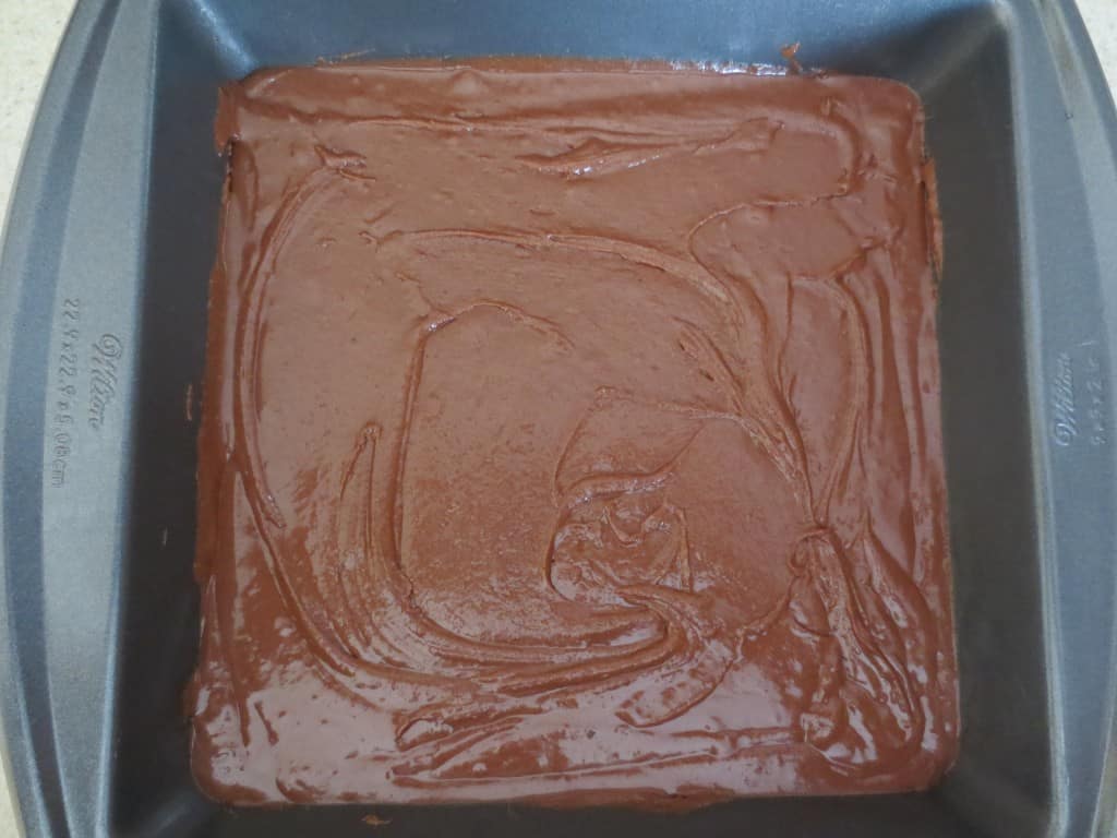 brownie batter in pan before baking
