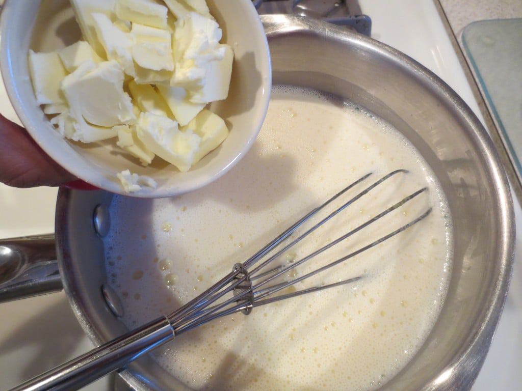 butter added to saucepan to make pudding 