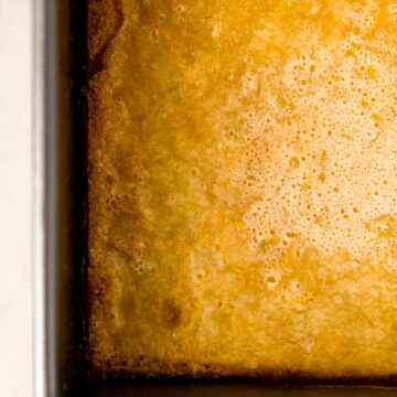 close up view of lemon bars in baking dish