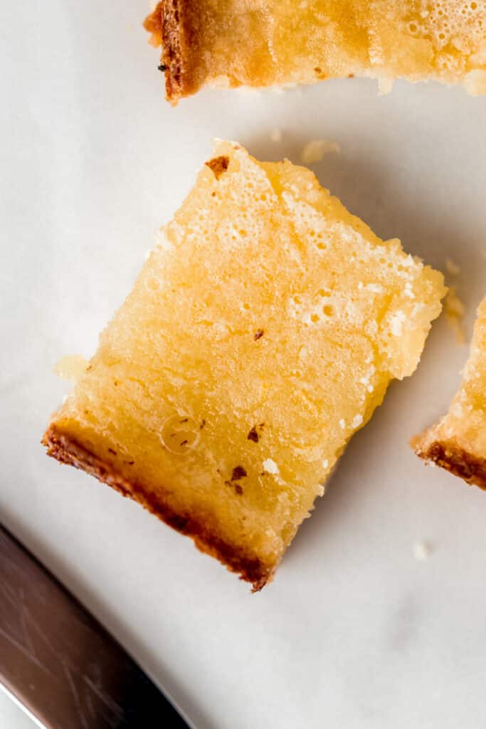 cut lemon bars next to knife 
