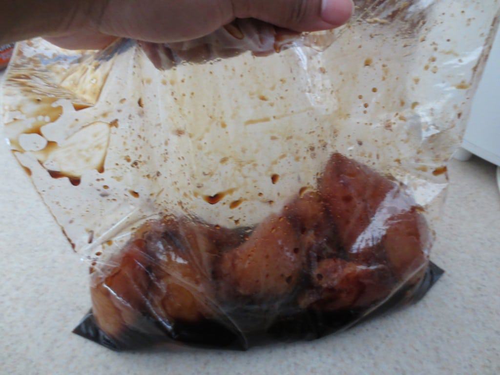 chicken marinating in plastic bag 