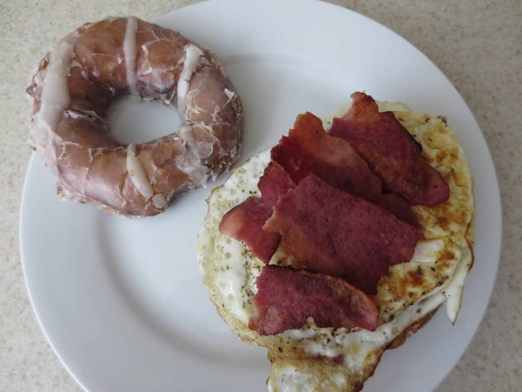Homemade Glazed Donut Breakfast Sandwich with bacon 