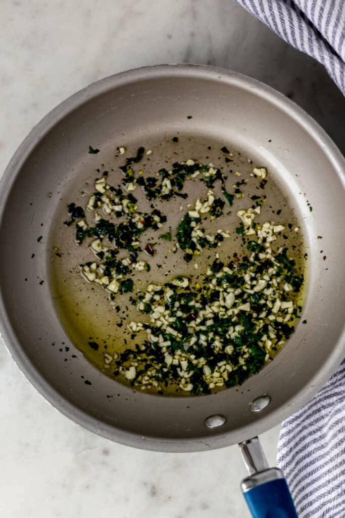 garlic, red pepper flakes, parsley, and olive oil in a skillet