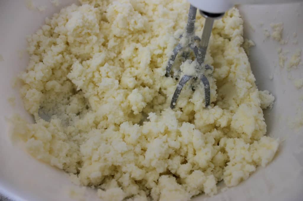 close-up of butter and sugar being mixed for Chocolate Sour Cream Pound Cake