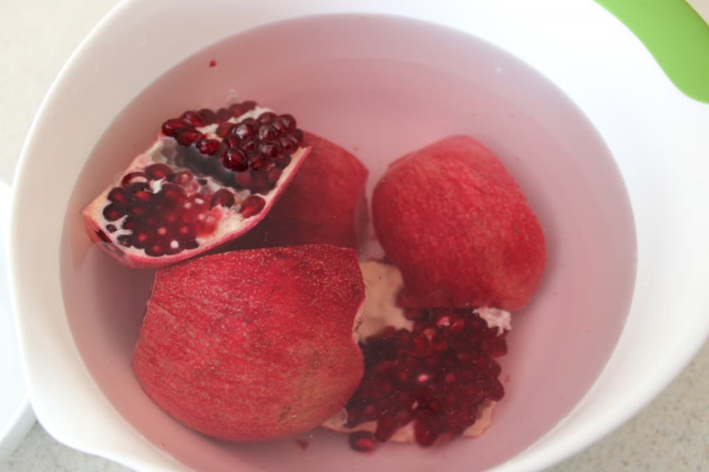 Seeding a Pomegranate in water is a simple and less messy way to enjoy this delicious fruit in the fastest amount of time. simplylakita.com