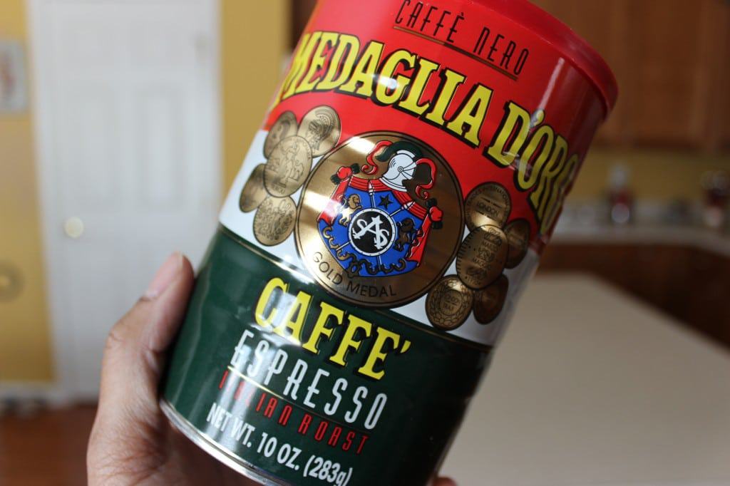 hand holding can of espresso to make gingerbread latte