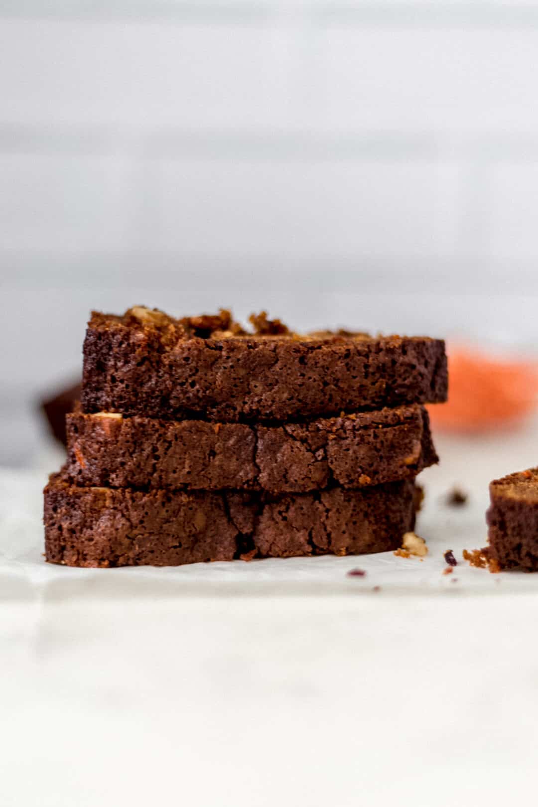 three slices of carrot raisin bread stacked on each other