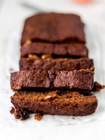 loaf of carrot raisin bread cut into slices