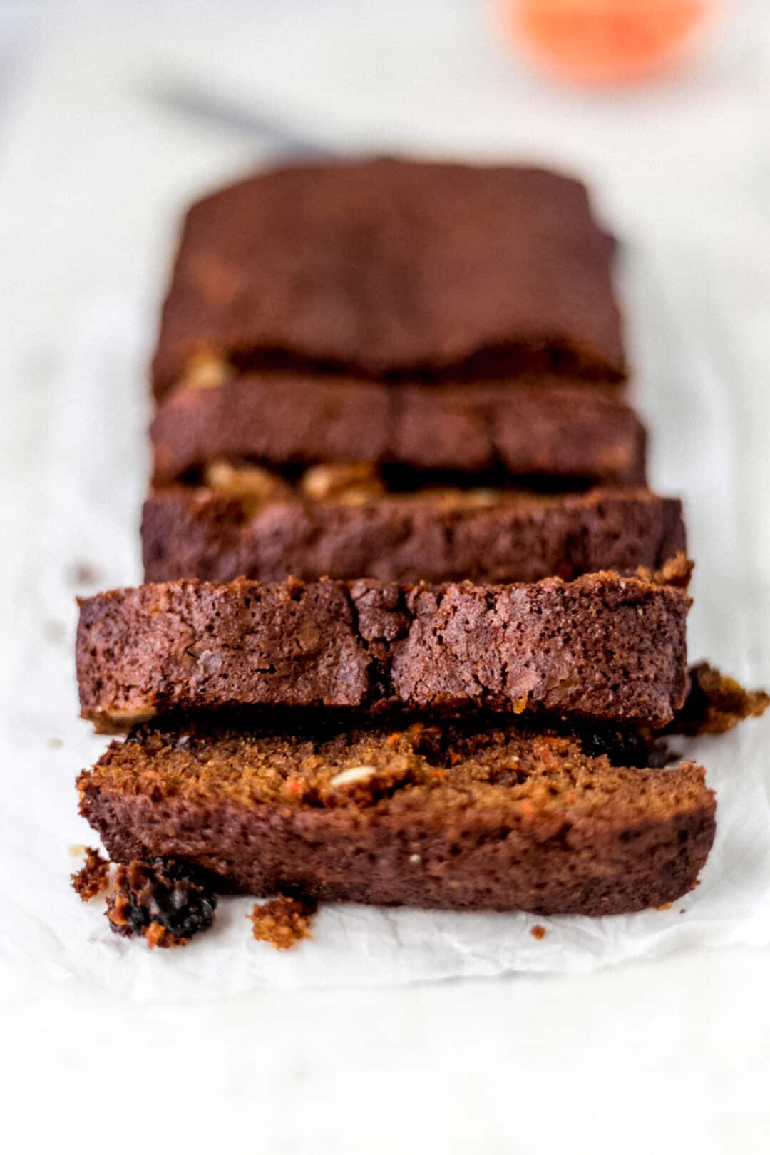 loaf of carrot raisin bread cut into slices