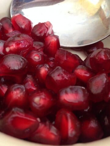 Seeding a Pomegranate in water is a simple and less messy way to enjoy this delicious fruit in the fastest amount of time. simplylakita.com