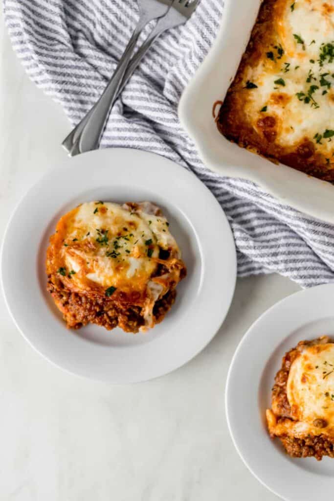 white plate of single portion of Ravioli Lasagna 