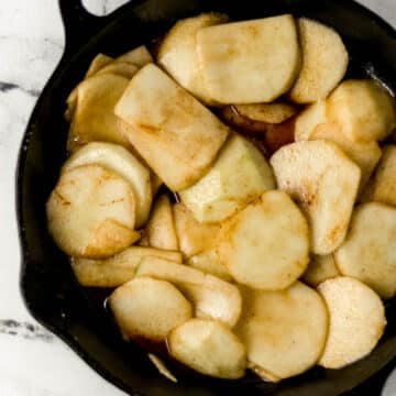 finished fried apples in cast iron skillet