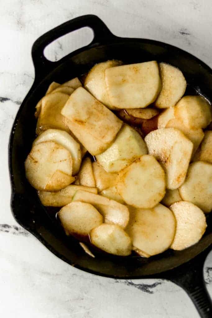 finished fried apples in cast iron skillet