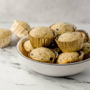 close up side view muffins in large white bowl