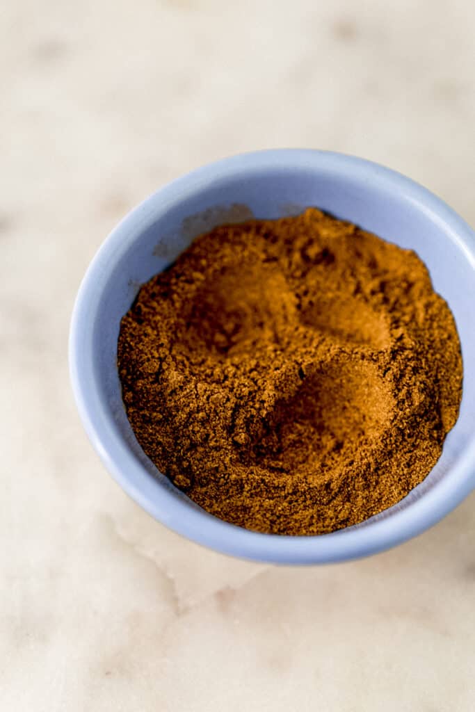 homemade pumpkin spice blend in small blue bowl 