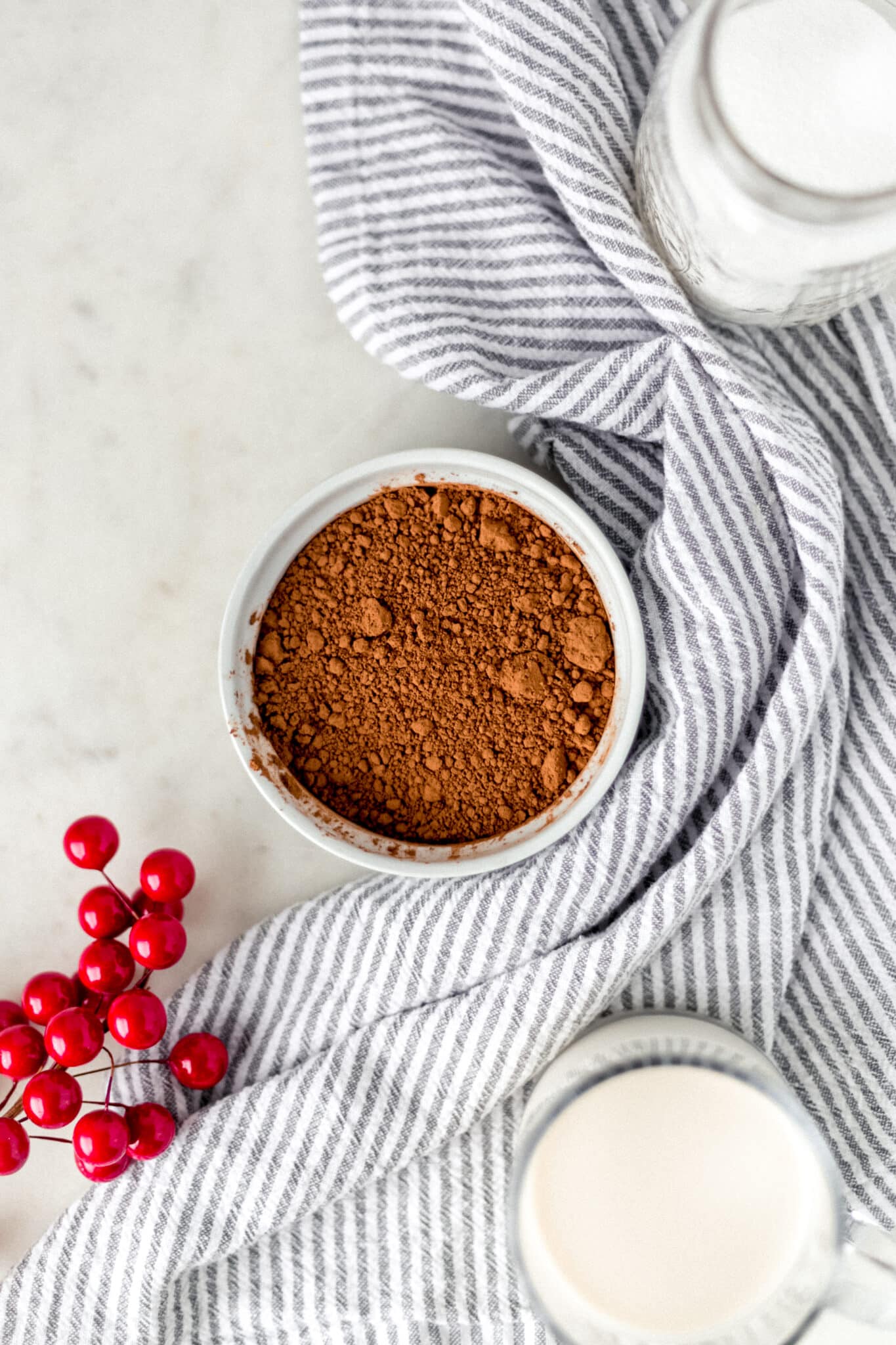 hot chocolate mix in a round white bowl with a napkin 