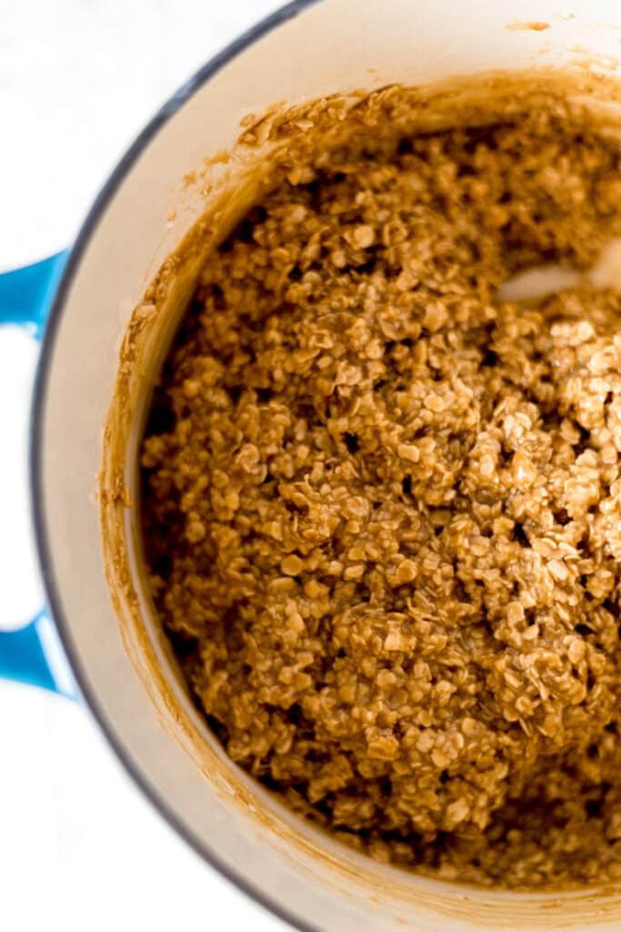 quick oats added to no bake eggnog cookie recipe in large pot