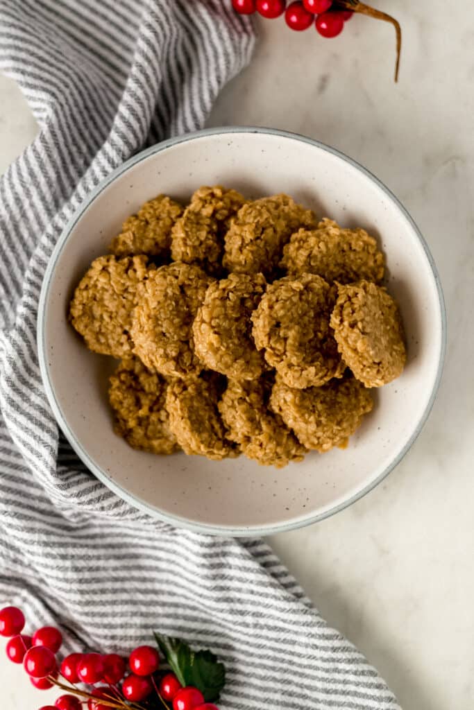 Bowl with a batch of no bake eggnog cookies over a napkin