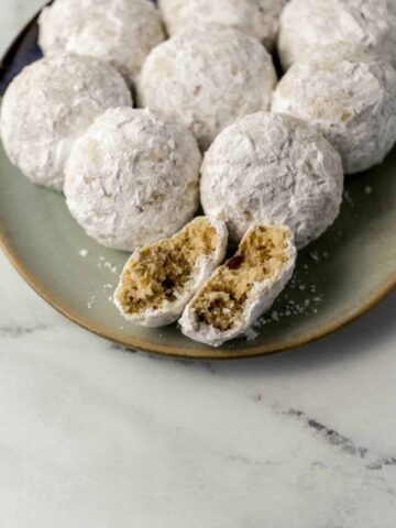 plate of tea cake with one broken in half