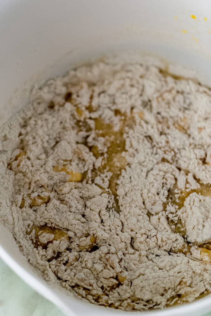 muffin mixture in large white mixing bowl 