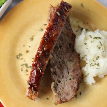 overhead view magical hour meatloaf on yellow plate