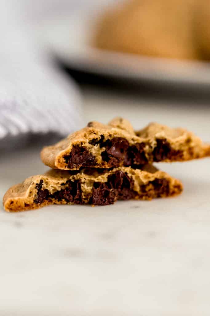 chocolate chip cookie cut in half to show the center 