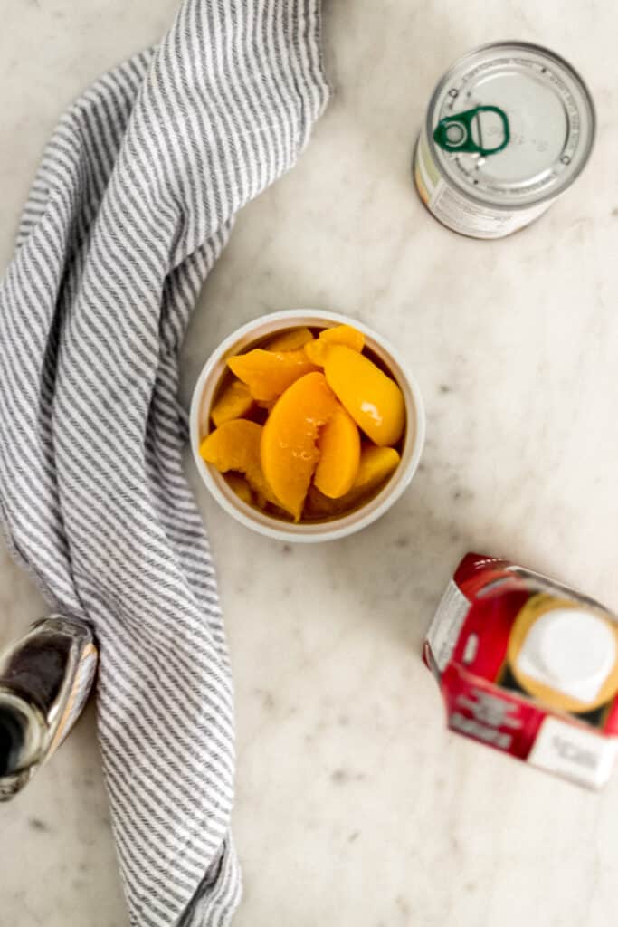 ingredients for creamsicle popsicles with cloth napkin