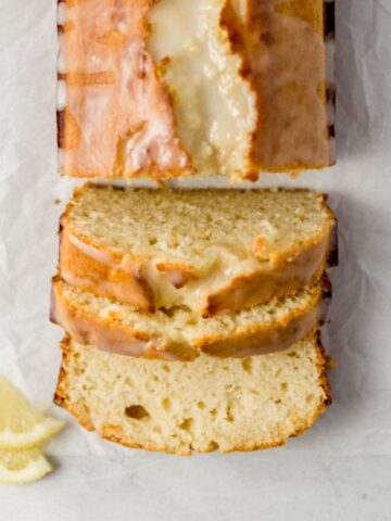 overhead view of sliced bread on parchment paper