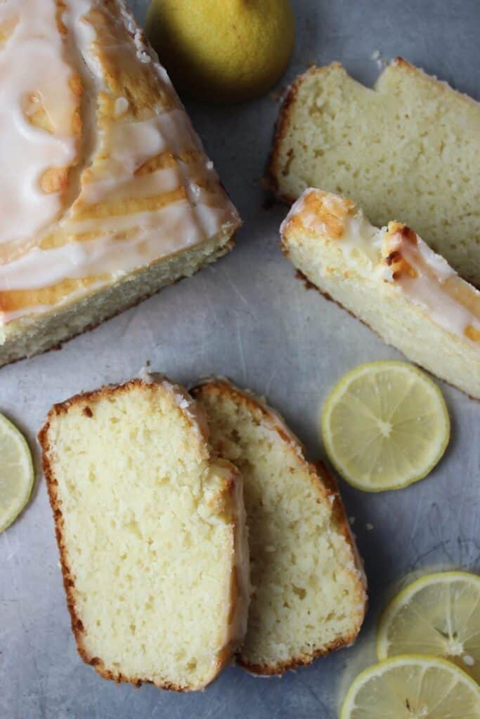 overhead view of slices of lemon bread beside slices of fresh lemon
