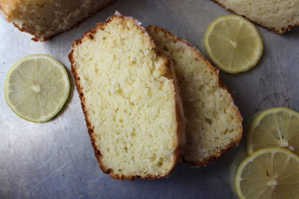 Glazed Lemon Loaf Bread is a sweet, creamy, and delicious recipe that is easy to make and the perfect sweet treat to enjoy anytime. simplylakita.com #lemon #bread