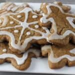 close up view of gingerbread cookies on white platter