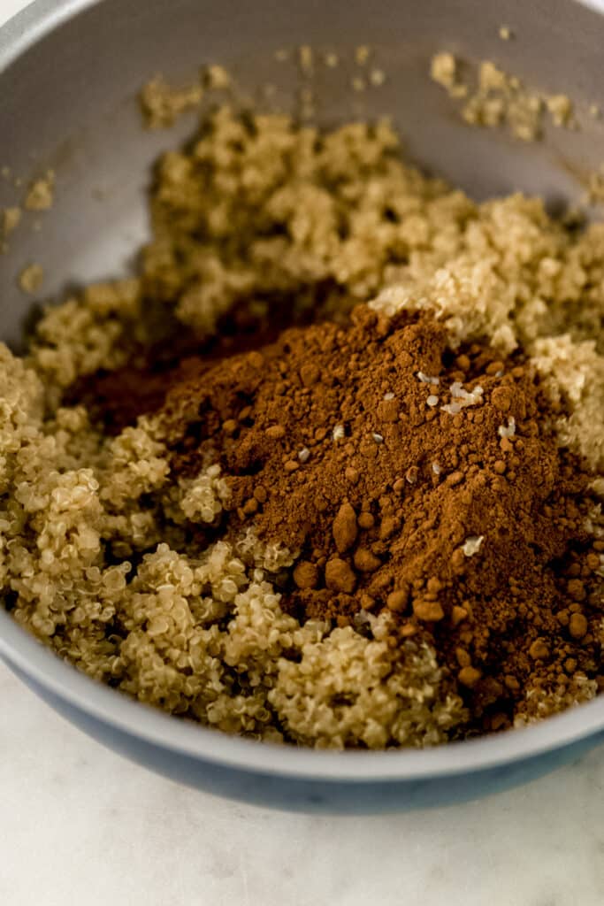 cocoa powder added to quinoa in sauce pan