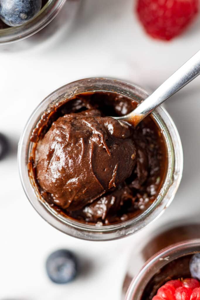 overhead view mousse in jar with spoon