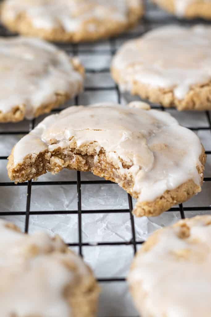 close up side view cookies with bite in it.