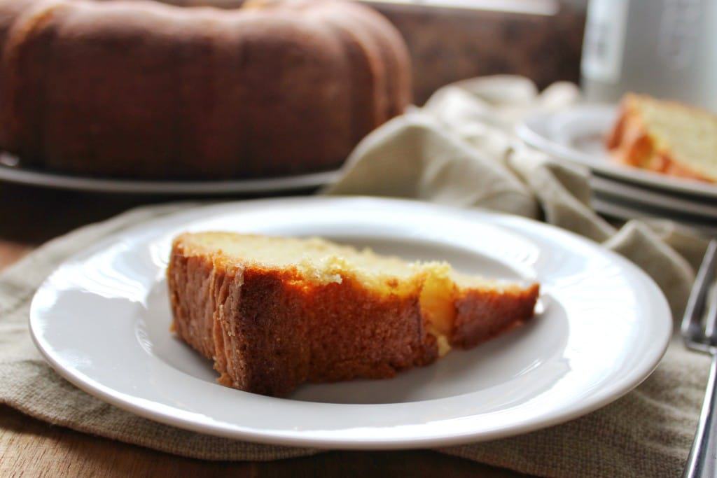 close up side view of slice of cake on white plate 