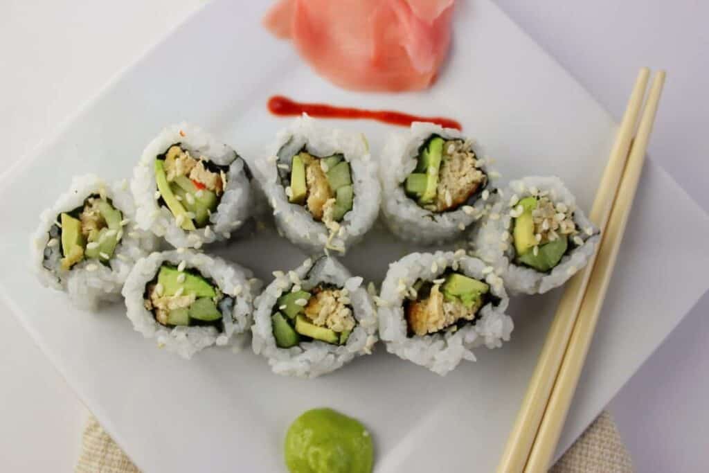 sushi on white square plate 