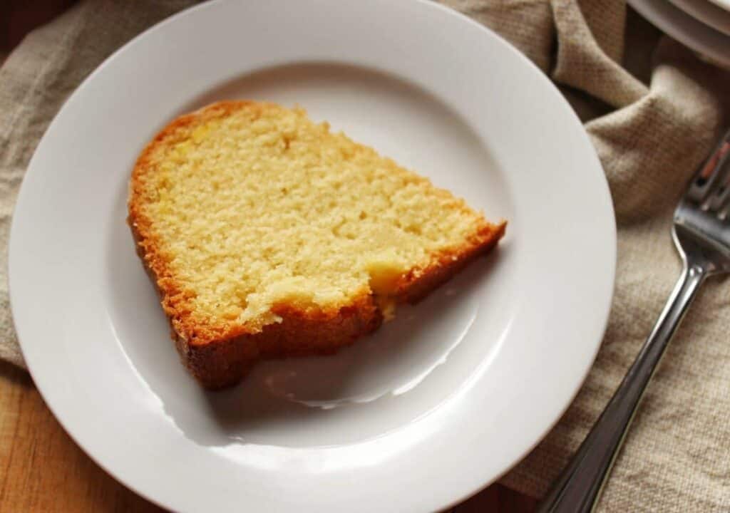 slice of cake on white plate 