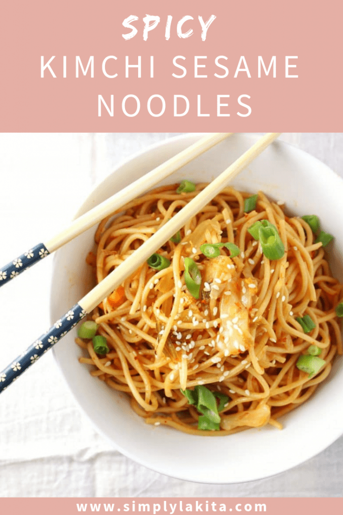 spicy kimchi sesame noodles in a bowl with chop sticks