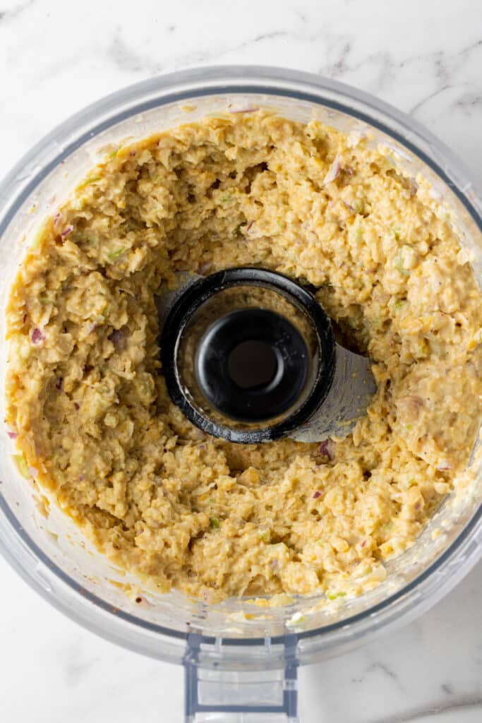 overhead view finished chickpea salad in food processor 