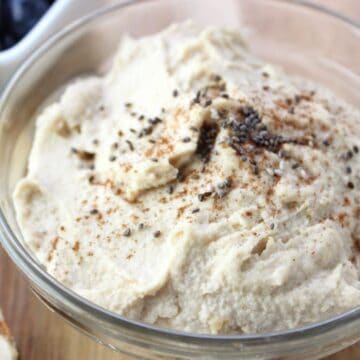 glass bowl with butter in it topped with chia seeds