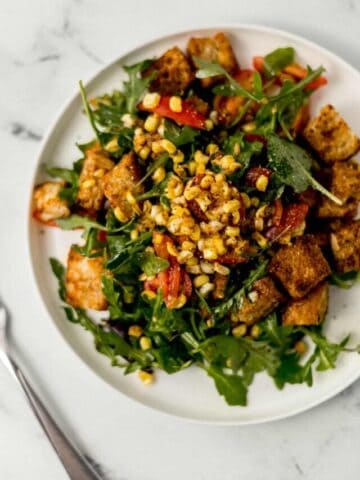 overhead view of serving of salad on white plate