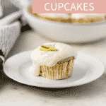close up side view of single margarita cupcake on white plate